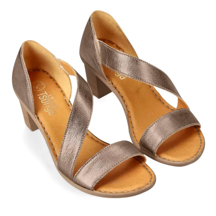 A pair of women's metallic gold heeled sandals with criss-cross straps and open toes, shown on a clean white background. The brand name 'Tsonga' is visible on the insole.