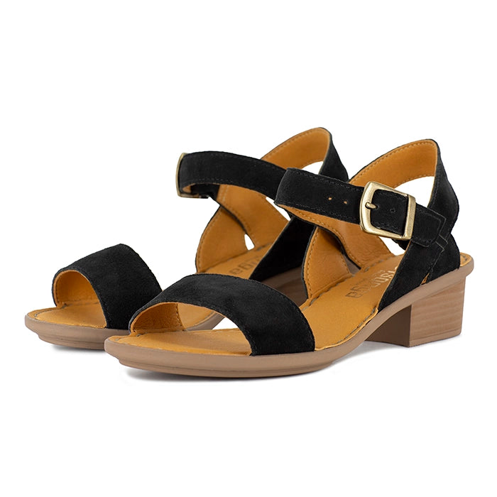 Black sandals with a gold buckle on a white background