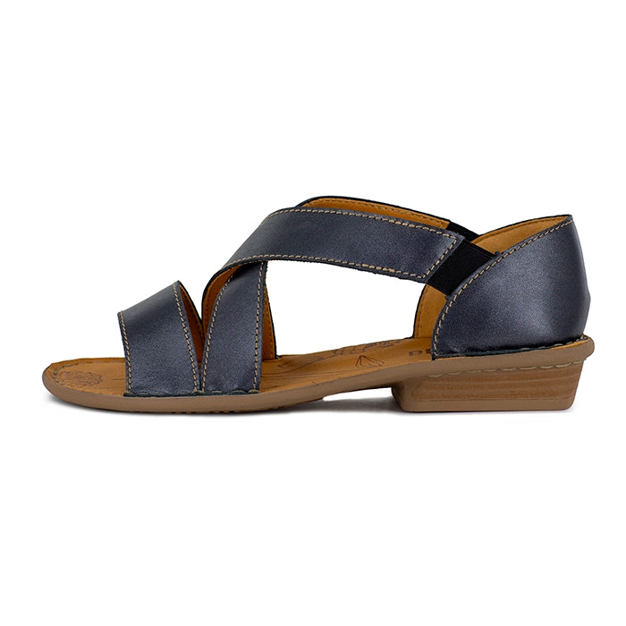 Black sandal with brown sole on a white background