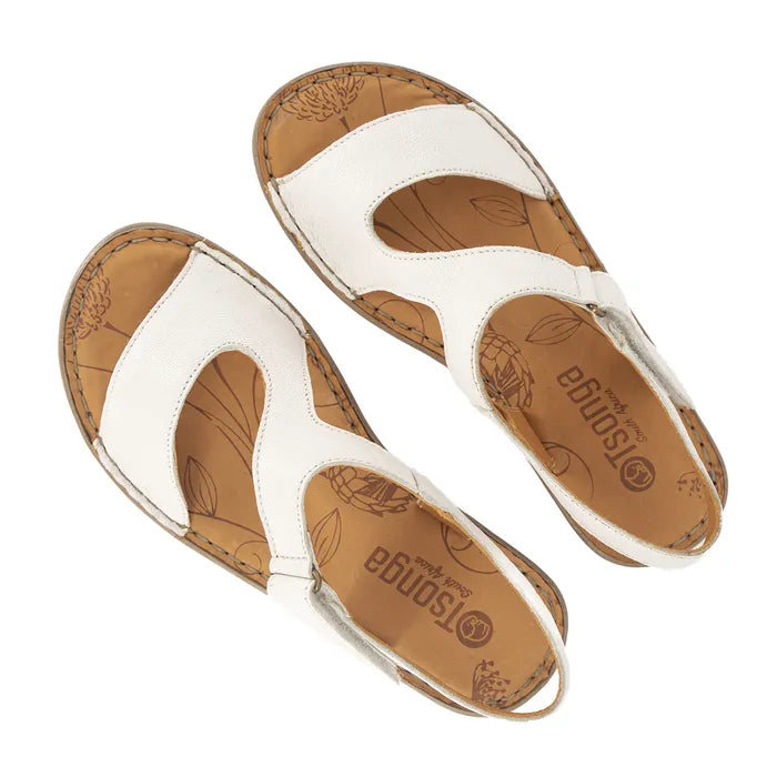 Women’s white leather slingback sandals with low heel.