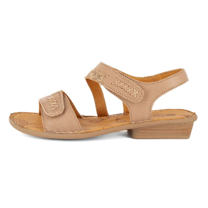 Beige sandal with block sole on a white background