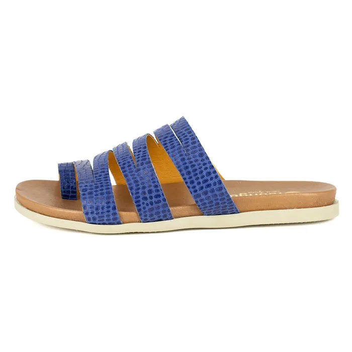 Blue sandal with a brown sole on a white background