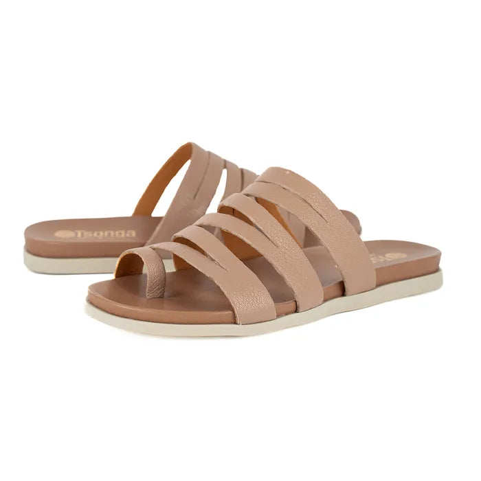 Pair of beige sandals with a white sole on a white background