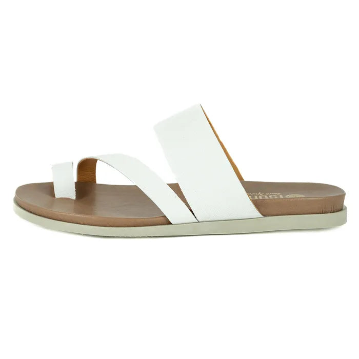 White sandal with brown sole on a white background
