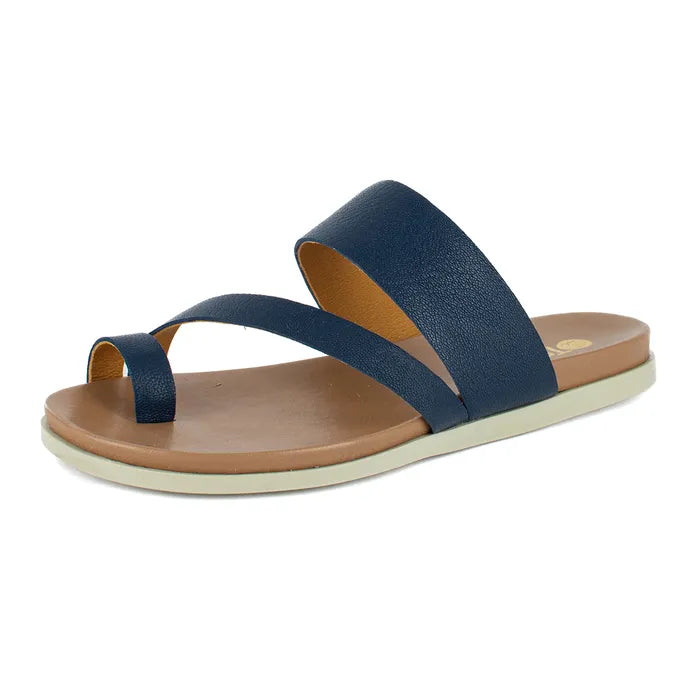 Navy sandal with brown sole on a white background