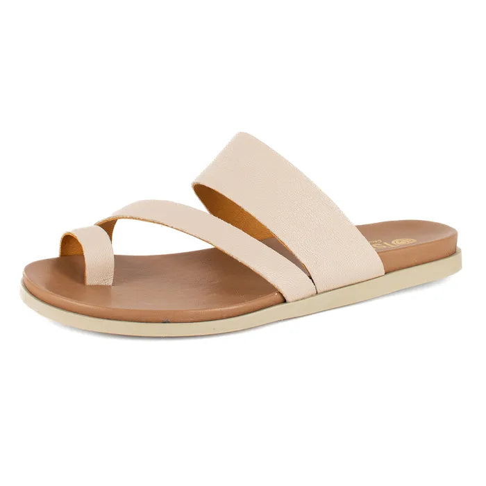 Beige sandal with brown sole on a white background
