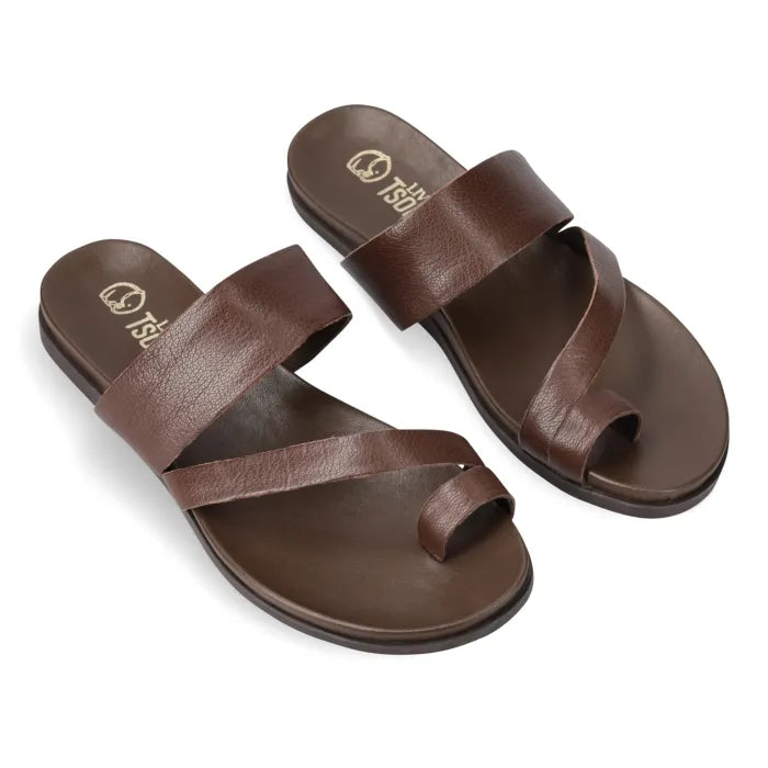 Pair of brown sandals with 'Tsonga' branding on a white background