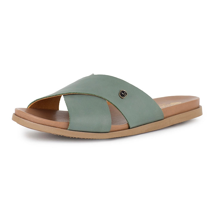 Green sandal with a tan sole on a white background