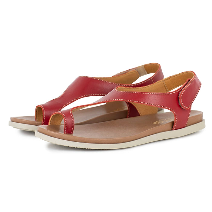 Red sandals with a white sole on a white background
