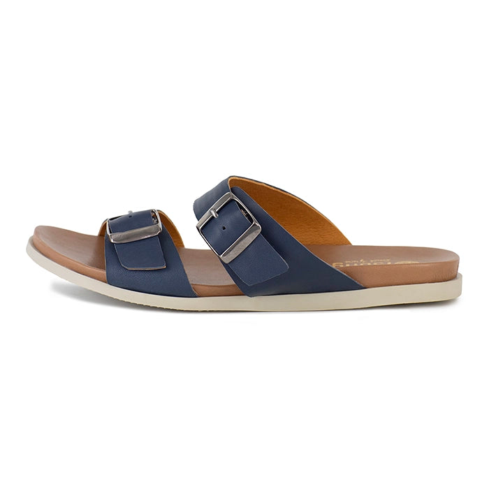 Navy sandal with brown sole on a white background