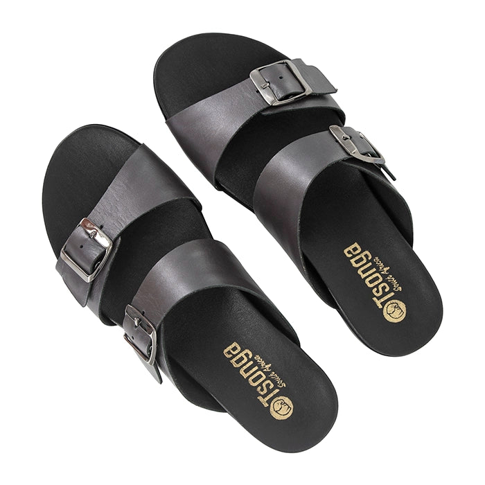 Silver sandals with buckles on a white background