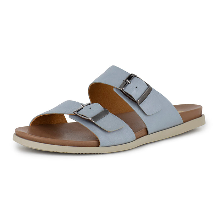 Light blue sandal with tan accents and a buckle on a white background