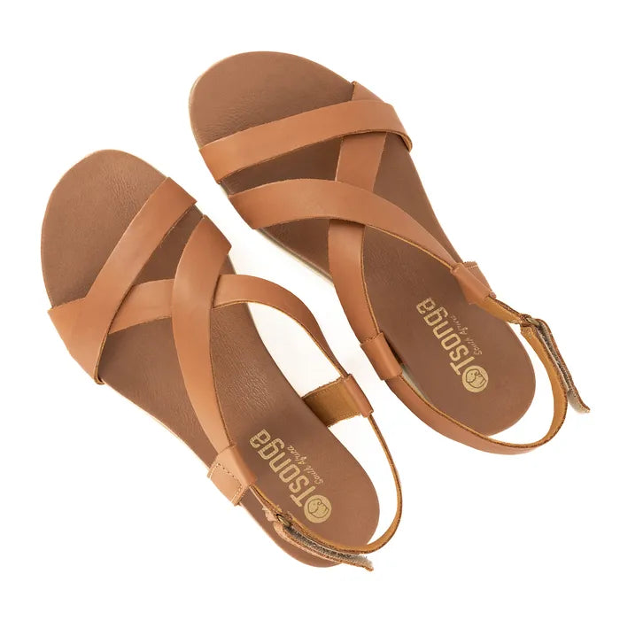 Pair of tan sandals with 'Tsonga' branding on a white background