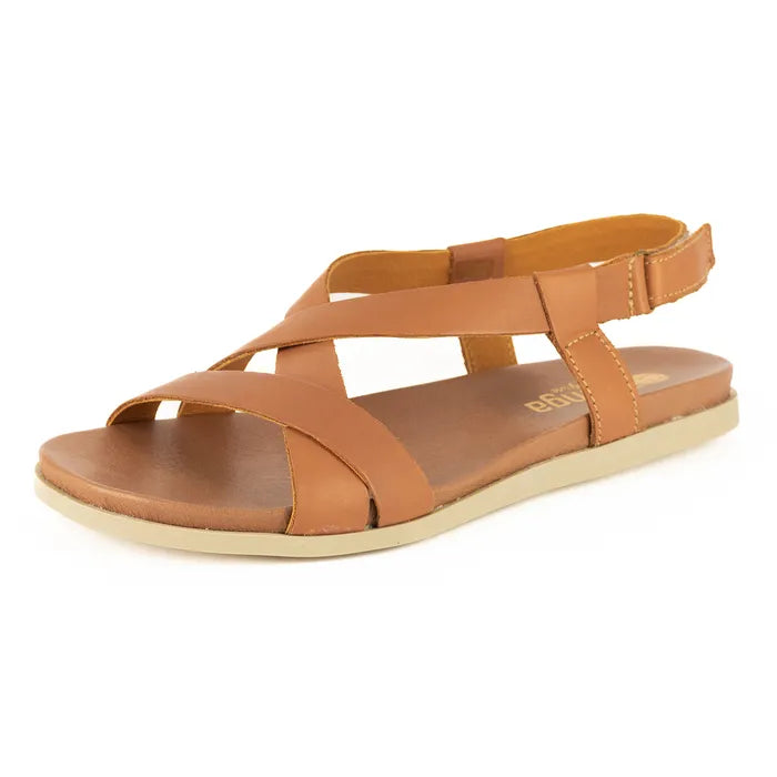 Tan sandal with criss-cross straps on a white background