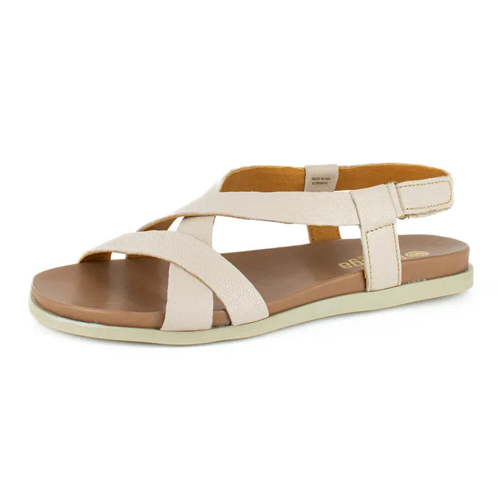 Beige sandal with brown sole on a white background