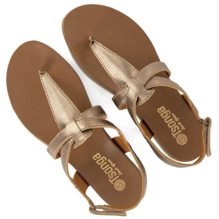 Pair of gold sandals with 'Tsonga' branding on a white background