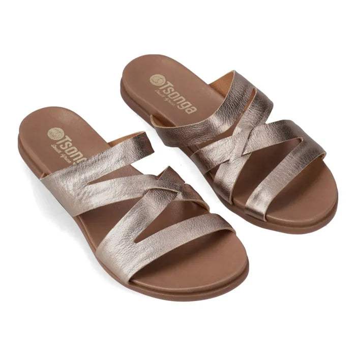 Pair of bronze sandals with a white background