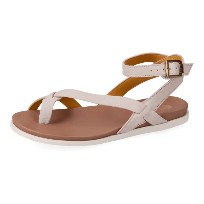 Cream sandal with tan sole on a white background