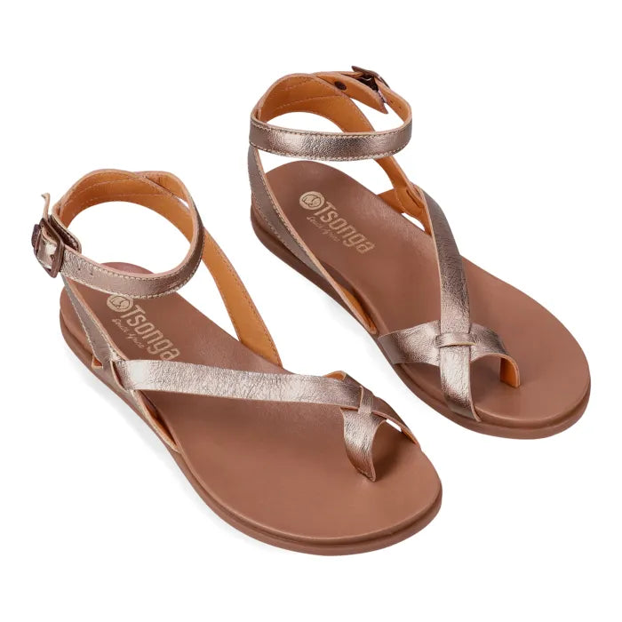 Pair of bronze sandals with 'Tsonga' branding on a white background