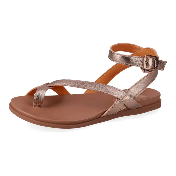 Gold sandal with a tan sole on a white background