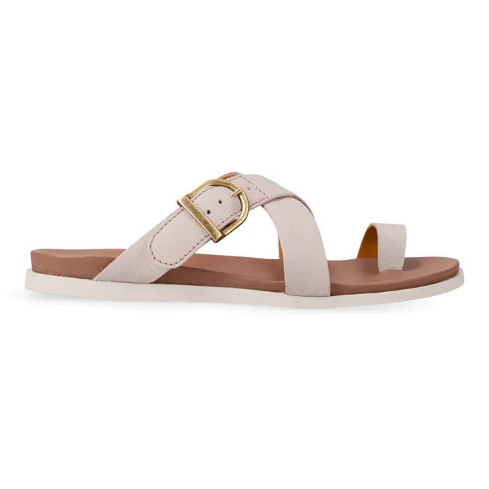 Beige sandal with a gold buckle on a white background