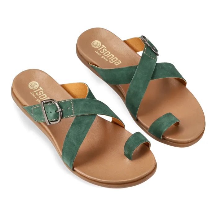 Green sandal with a tan sole on a white background