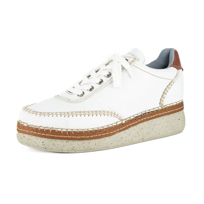 White sneaker with brown accents on a white background