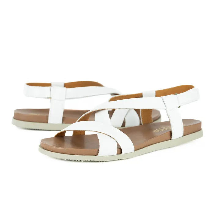 White sandals with brown soles on a white background