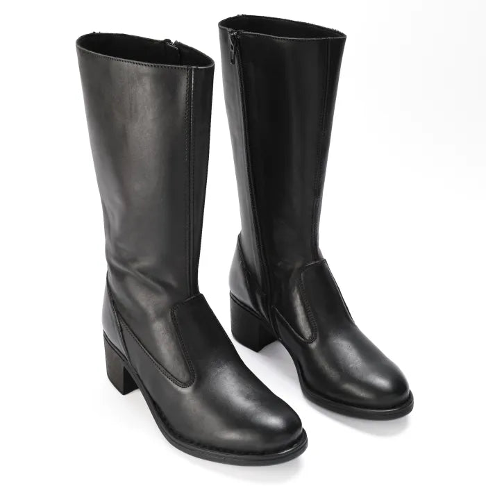 Pair of black knee-high boots on a white background