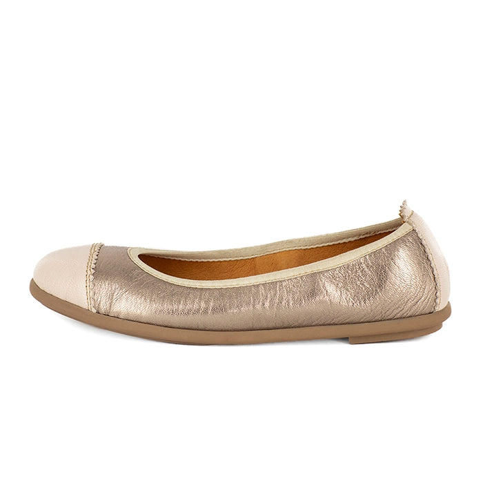 Gold and beige flat shoe on a white background