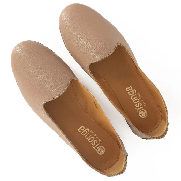 Pair of beige shoes with 'Tsonga' branding on a white background