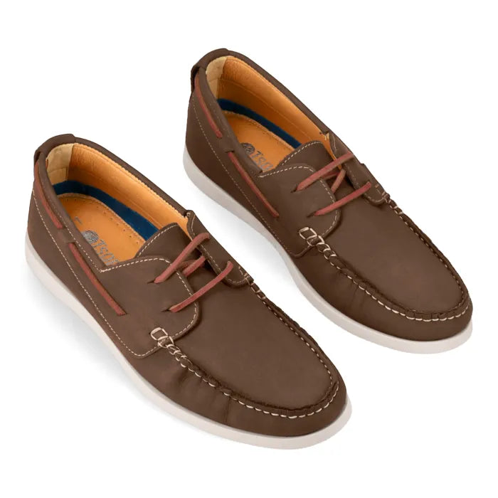 Pair of brown leather boat shoes on a white background