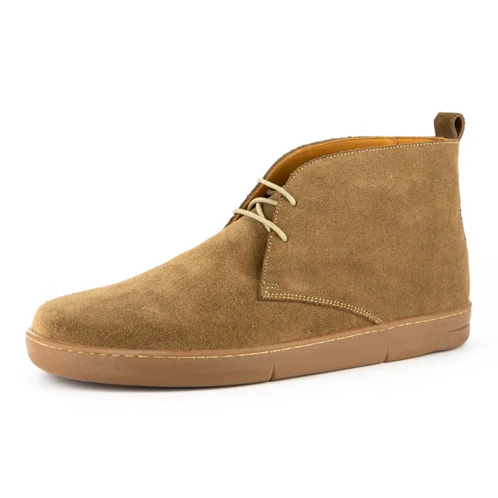 Tan suede shoe on a white background