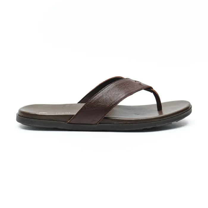 A single Tsonga flip-flop sandal in dark brown, shown from a side profile view against a solid white background.
