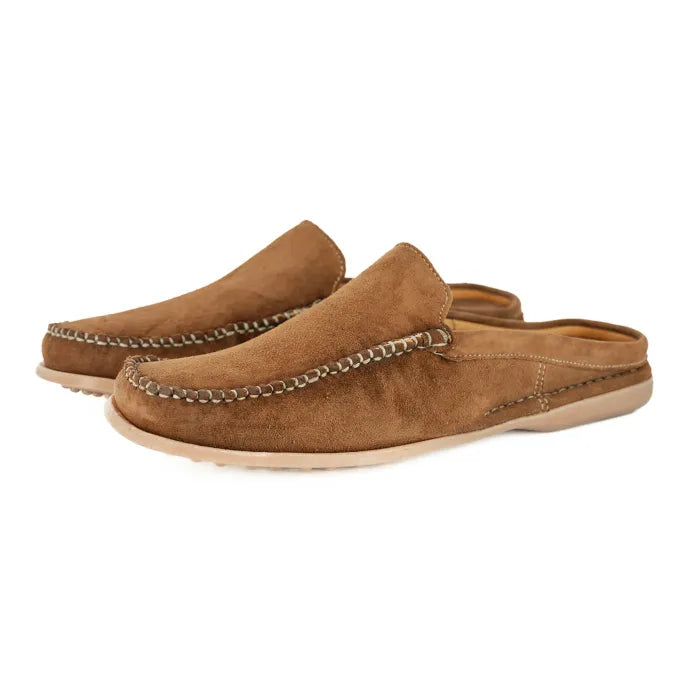 Pair of brown suede slip-ons on a white background