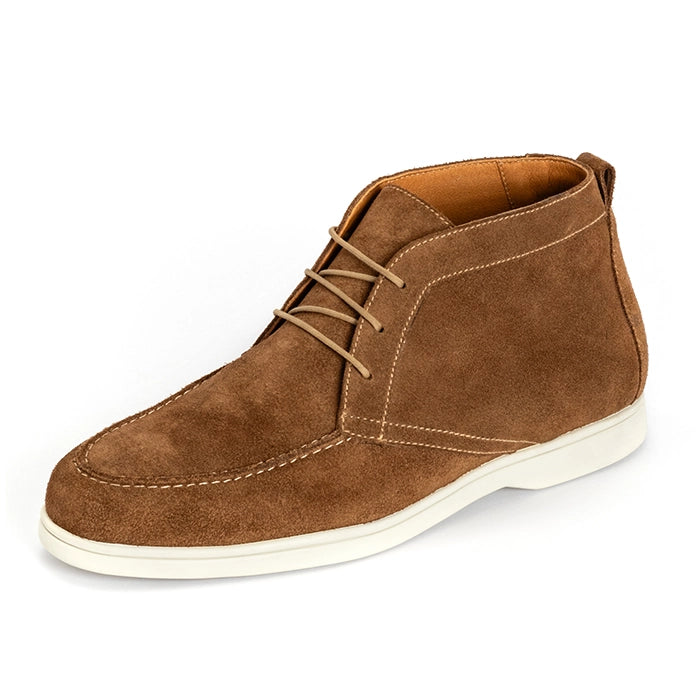 A brown suede chukka-style shoe with tan laces and contrast stitching, featuring a white rubber sole, shown on a plain white background.
