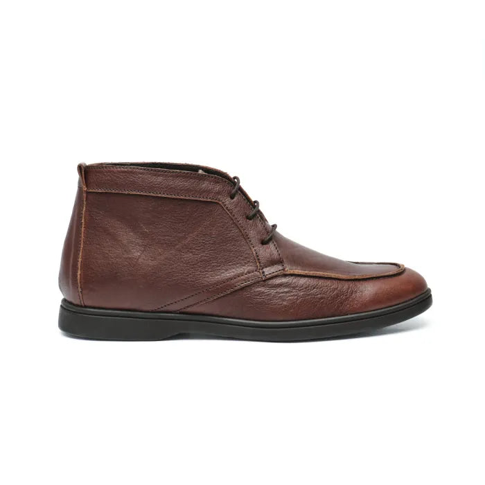 Brown leather dress shoe on a white background