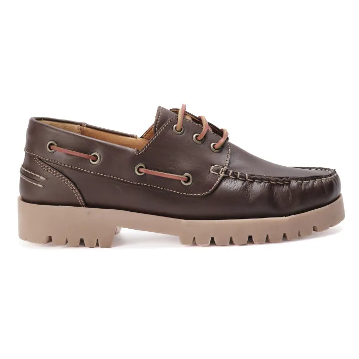 Brown leather boat shoe on a white background