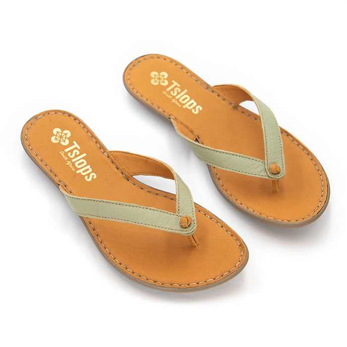 A pair of Tslops flip-flop sandals with tan footbeds and light sage green straps, displayed on a clean white background.