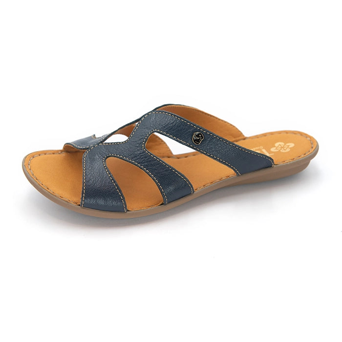 A single women's slide sandal with navy blue leather straps and a tan footbed, shown from a side profile on a white background.