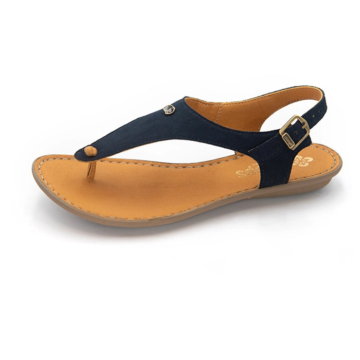A single women's thong sandal shown in a side profile view on a white background. The upper strap is navy blue suede, while the footbed and ankle strap lining are tan.