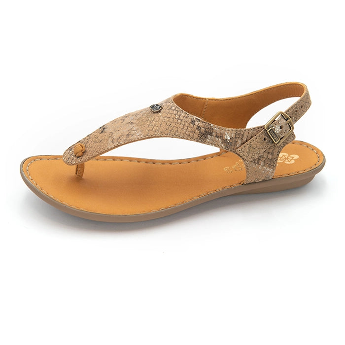 A women's flat thong sandal with a beige and brown snakeskin-patterned upper, a tan footbed, and a matching adjustable ankle strap with a metal buckle, shown on a white background.