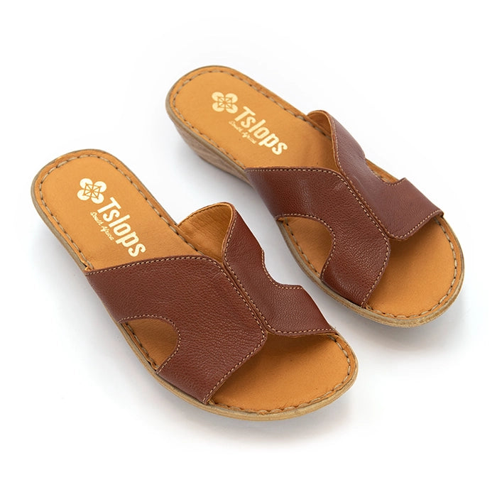 A pair of brown leather slide sandals with tan insoles, shown on a clean white background. The brand name 'Tslops' is printed on the insole.