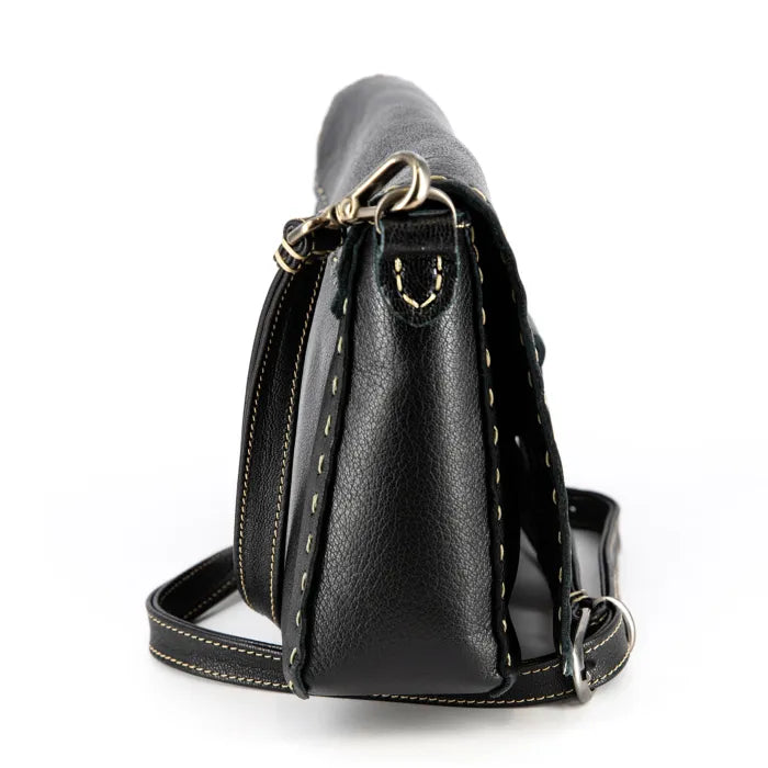 Black leather handbag with gold accents on a white background