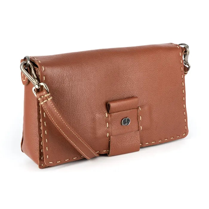 Brown leather handbag with a strap on a white background