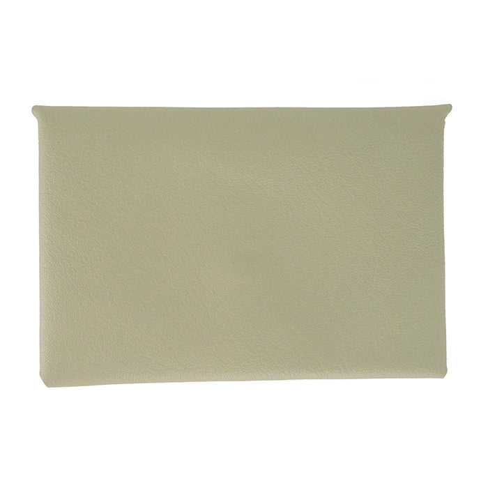 Front of sage leather clutch purse.