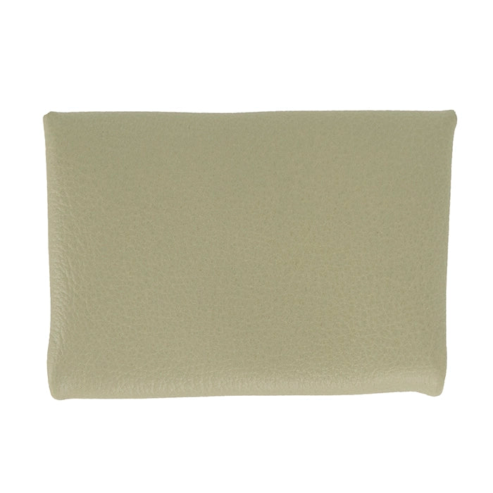 Green leather pouch on a white background