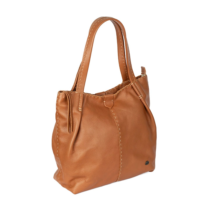 Tan leather handbag on a white background