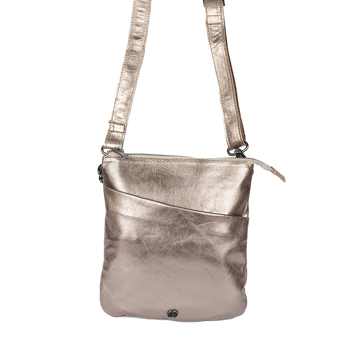 Front view of a gold leather crossbody bag on a white background