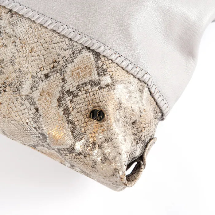 Close-up of a textured tote bag with a white background